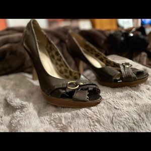 Brown heels with gold buckle